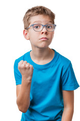 Blond hair serious boy in glasses showing his fist, isolated on white background