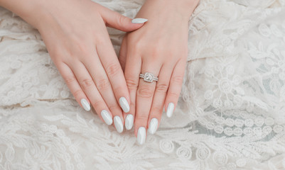 Naklejka premium White classical pearl manicure, close up, beauty details
