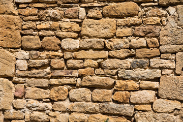 Close-up of the old stone wall in  Beynac-et-Cazenac, France