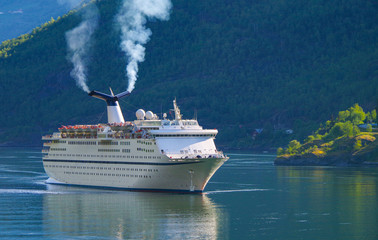 Cruiseship or cruise ship liner in Flam, Norway during cruising to Norwegian Fjords in...