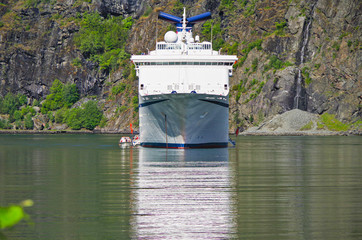 Cruiseship or cruise ship liner in Flam, Norway during cruising to Norwegian Fjords in...
