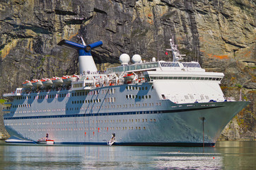 Cruiseship or cruise ship liner in Flam, Norway during cruising to Norwegian Fjords in...