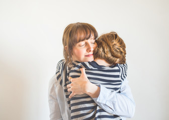 Young mother and child hugging. Mothers day concept - 349151440