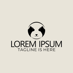 Logo design of two cats that form a negative face of a dog's face.