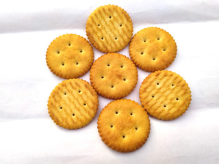 Stack of sweet meal digestive biscuits isolated on white