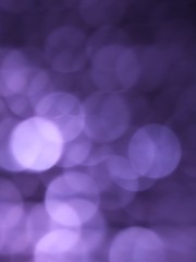 bokeh of lights on Purple and black background