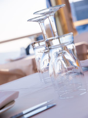 Open restaurant terrace with amazing sea view on Santorini island. Cyclades, Greece