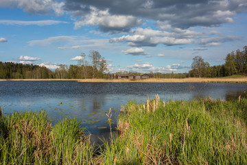 City Araisi, Latvia. Reconstructed wooden castle on the lake. Historic building.
