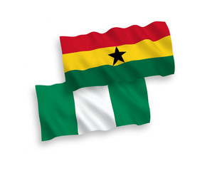 National vector fabric wave flags of Ghana and Nigeria isolated on white background. 1 to 2 proportion.