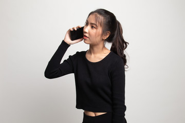 Fototapeta premium Young Asian woman talking with mobile phone.