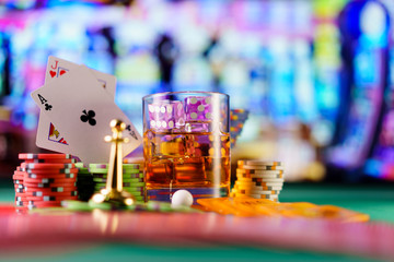 cocktail glass on the casino gambling table