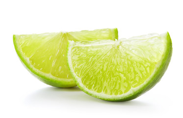 sliced green lime fruit isolated on white background