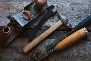 old tools on wooden background