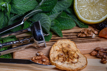 Fototapeta premium Fruits and kitchen herbs still life in the kitchen