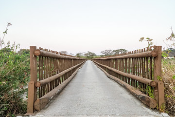 wooden bridge over the river with low angle and endless point of view 