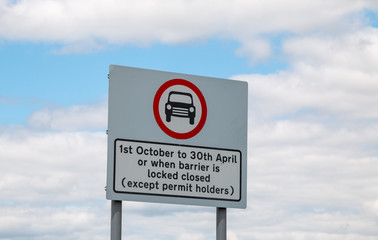 Countryside sign telling you the road is closed during winter