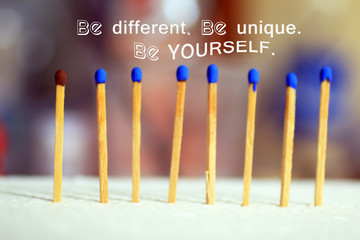 Inspirational motivational quote - Be different, be unique, be yourself. With wooden match sticks...