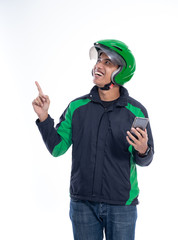 man rider wear helmet pointing to blank copyspace