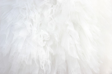Texture of a wavy surface of a chiffon fabric as a background