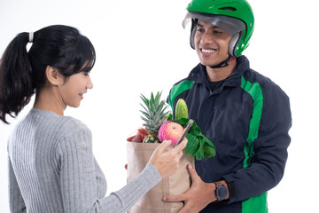 grocery store delivery. driver courier with food sending online order to female customer isolated over white