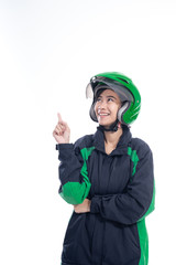 Fototapeta premium female uber taxi driver presenting to copyspace isolated over white