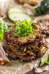 Crunchy zucchini pancakes with bacon parsley herbs and other ingredients