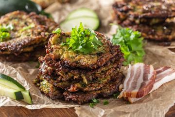Crunchy zucchini pancakes with bacon parsley herbs and other ingredients