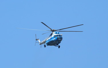 Fototapeta na wymiar Walking helicopter in the sky, St. Petersburg, Russia, July 2017