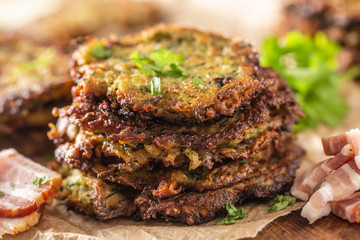 Crunchy zucchini pancakes with bacon parsley herbs and other ingredients