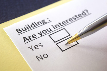 Fototapeta premium One person is answering question about building.