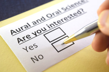 One person is answering question about aural and oral science.