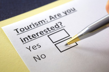Fototapeta premium One person is answering question about tourism.