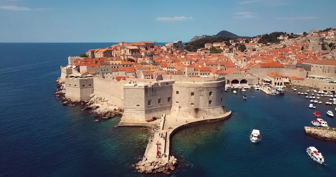 4K Footage Aerial View to the Old City Fortification and Red Roofs in Dubrocnik, Croatia