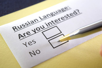 Obraz premium One person is answering question about russian language.