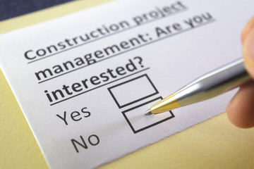 One person is answering question about construction project management.