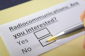 One person is answering question about radiocommunications.