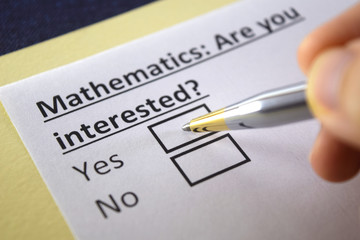 Obraz premium One person is answering question about mathematics.