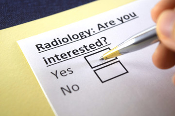 Obraz premium One person is answering question about radiology.