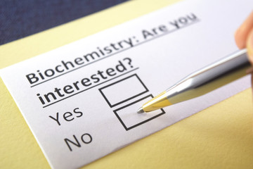 Obraz premium One person is answering question about biochemistry.