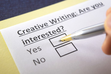 Obraz premium One person is answering question about creative writing.