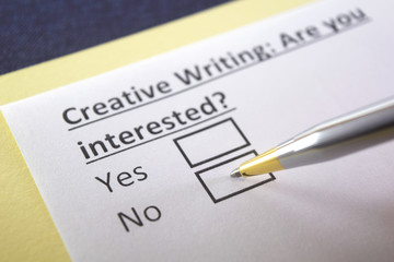 Fototapeta premium One person is answering question about creative writing.