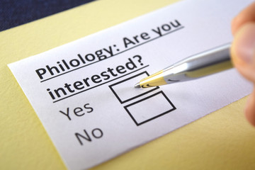 Obraz premium One person is answering question about philology.