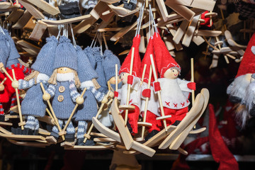 Christmas wood toy decorations and ornaments on the market in Vienna. For sale on Christmas fair