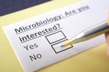 Fototapeta premium One person is answering question about microbiology.