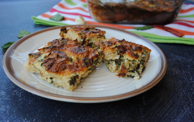 Nettle Pie Slices in a beige retro plate. Homemade pie. 