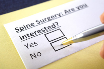 One person is answering question about spine surgery.