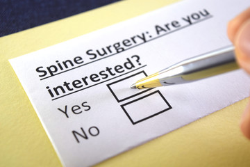 One person is answering question about spine surgery.