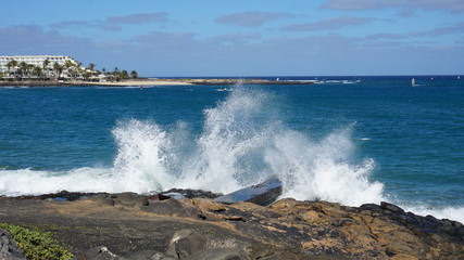 waves crashing on rocks
