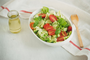 Vegetable mix salad in a bowl on kitchen table