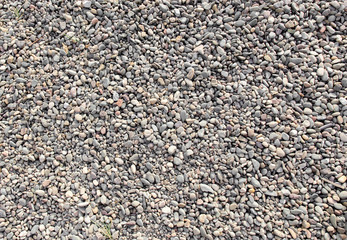 Fine gravel texture or gravel background for the design. Sea or river pebbles. Fine stone for building and mixing concrete.